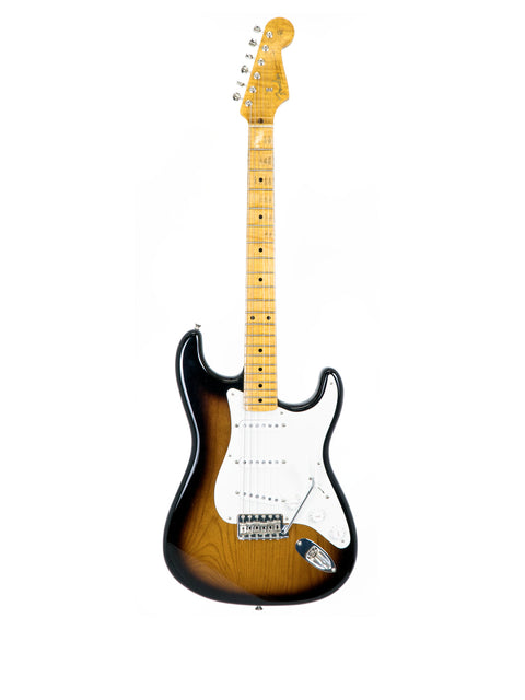 A Fender Stratocaster guitar with a sunburst finish and a maple neck.