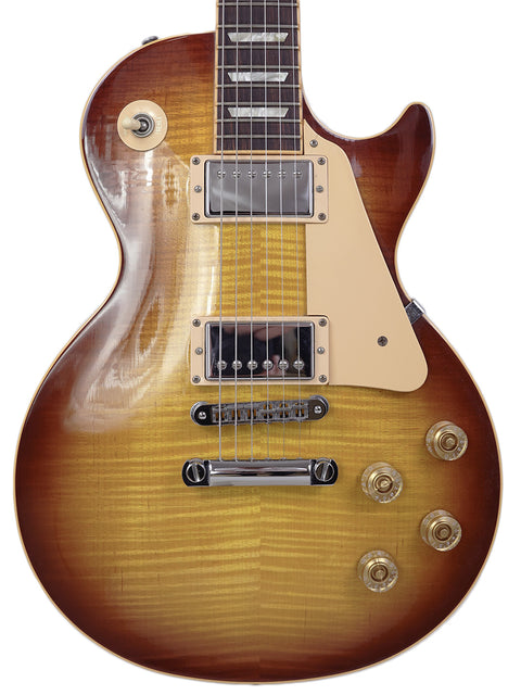 A Gibson Les Paul Custom in sunburst finish, showcasing its elegant design and craftsmanship from the USA, 2009 model.