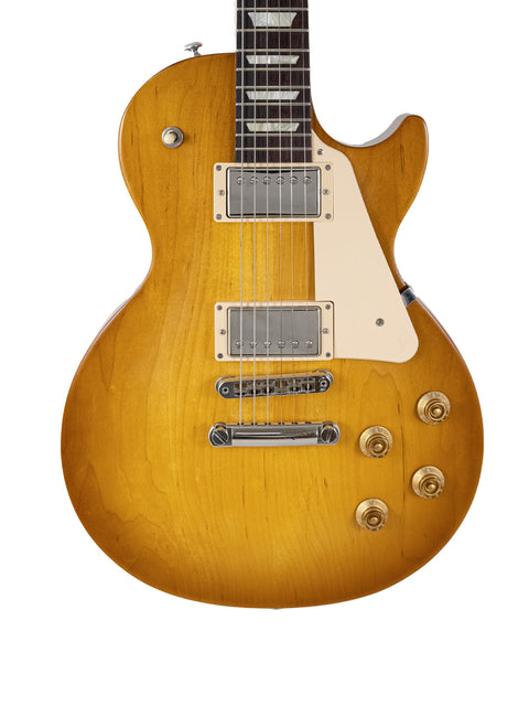 A Gibson Les Paul Custom in sunburst finish, showcasing its elegant design and craftsmanship from the USA, 2019 model.