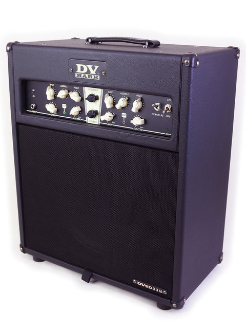 A black DV Mark guitar amplifier with control knobs and a speaker grille.