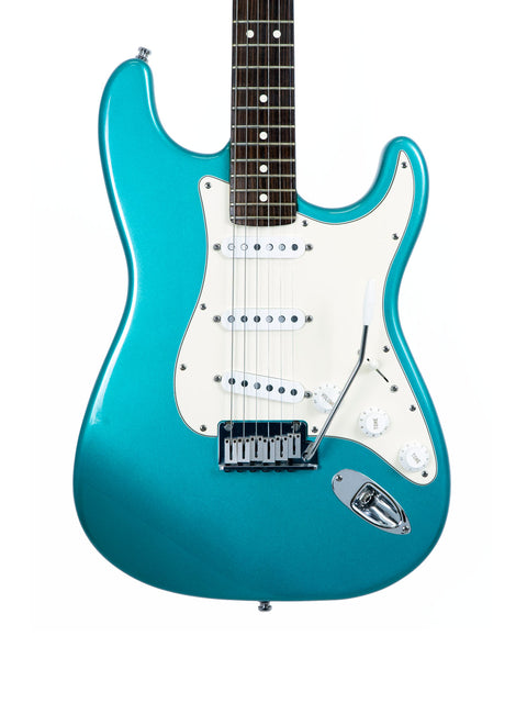 A blue electric guitar with a white pickguard, showcasing the Fender 40th Anniversary American Standard Stratocaster from 1994.
