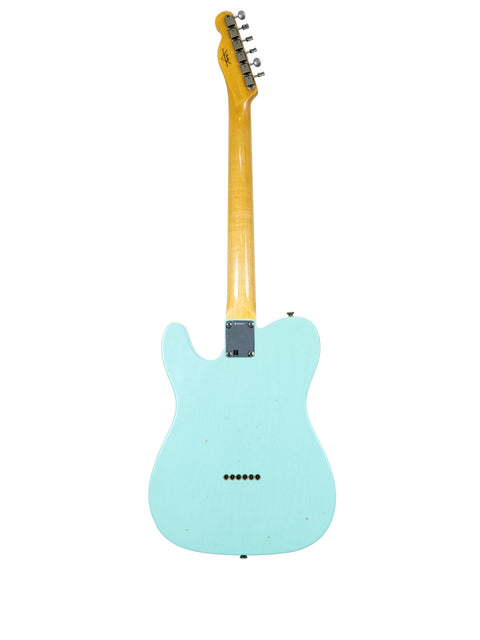 A blue electric guitar with a wooden body, showcasing the Fender Custom Shop 60s Journeyman Telecaster from 2018.