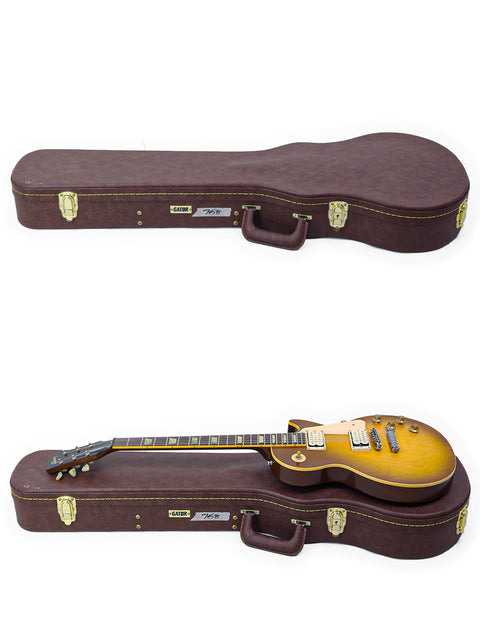 A brown case holds two guitars, including a Gibson Les Paul Classic 1960 Reissue from 1998.