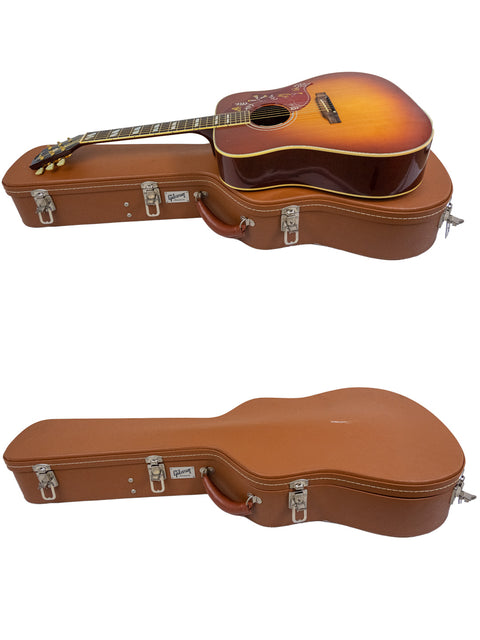  A case holds two guitars with a sunburst finish, including a 2012 Gibson Hummingbird True Vintage from the USA.