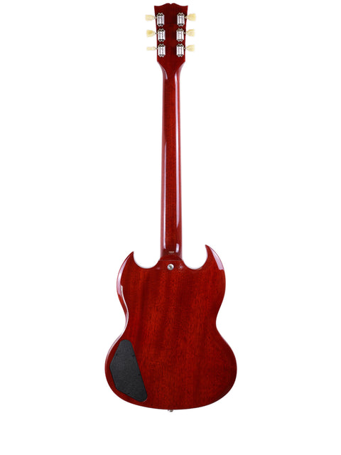 A striking red Gibson SG Standard ‘61 guitar featuring a black pickguard, highlighting its iconic shape and craftsmanship.