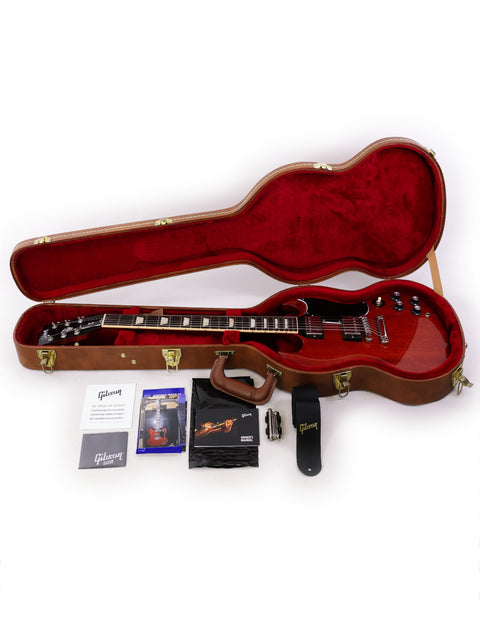 A striking red Gibson SG Standard ‘61 guitar from 2019, accompanied by its case and essential accessories.