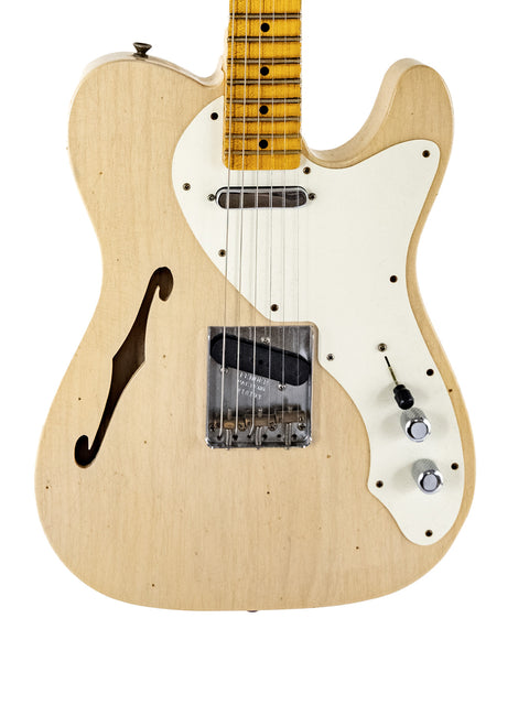 A vintage-style Fender Telecaster guitar from 2018, showcasing a wooden body and a distinctive white pickguard.