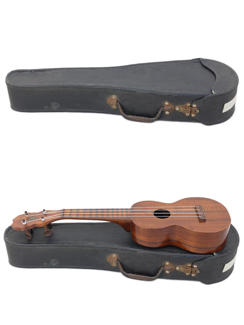 A white background showcases two ukuleles in a case, including a 1927 Paul F. Summers 'Moana' Style 5 Koa from Hawaii.