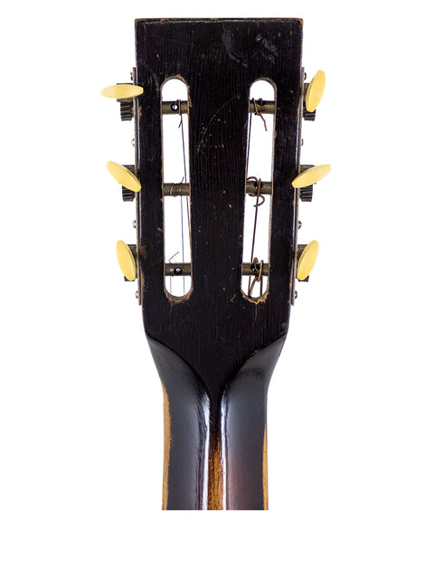 Black 1930s Gibson D-18B-1 soprano guitar with gold hardware, a stunning example of vintage American musical instruments.