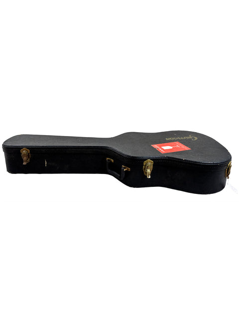 Black guitar case featuring a red label, representing the vintage Regal Dobro Model from the USA, 1930s.