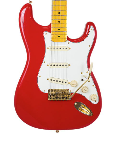 Bold red electric guitar with a white body, StrXX Partscaster, crafted in the USA in 2012.
