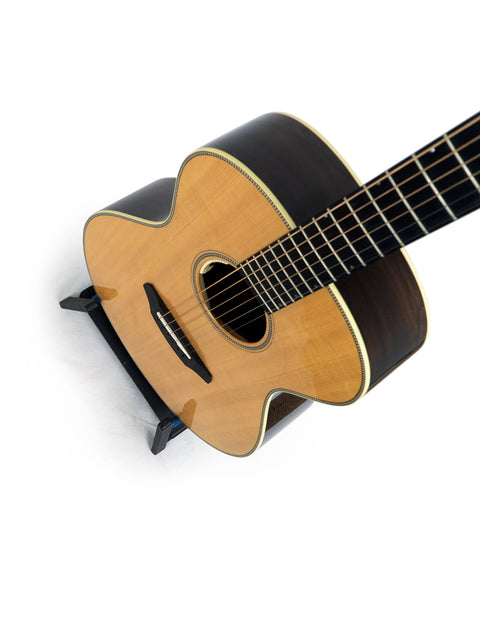 Breedlove Journey Concert guitar on a white background, showcasing its Sitka and Brazilian wood craftsmanship, #22 of 50.