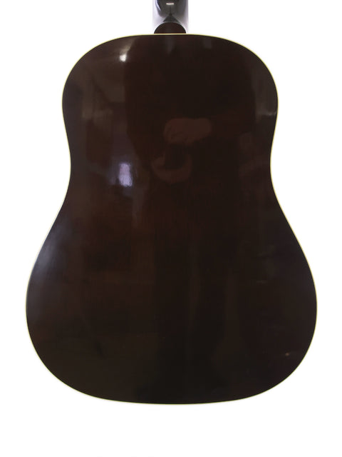 Brown Gibson J-45 True Vintage guitar (2012) with a stylish black pick guard, showcasing its classic design.