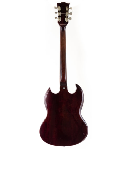 Brown vintage Gibson SG Pro guitar from 1972 with a simple white background.