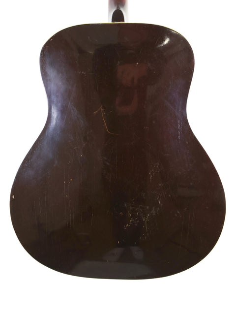 Classic 1934 Gibson TG50 tenor guitar featuring a rich brown finish and stylish black pick guard, ideal for any music lover.
