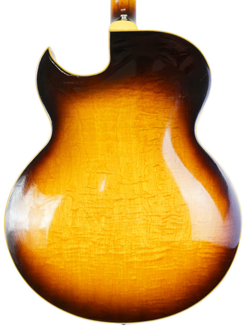 Classic 1966 Gibson Byrdland guitar with a striking sunburst finish, embodying timeless style and exceptional quality.
