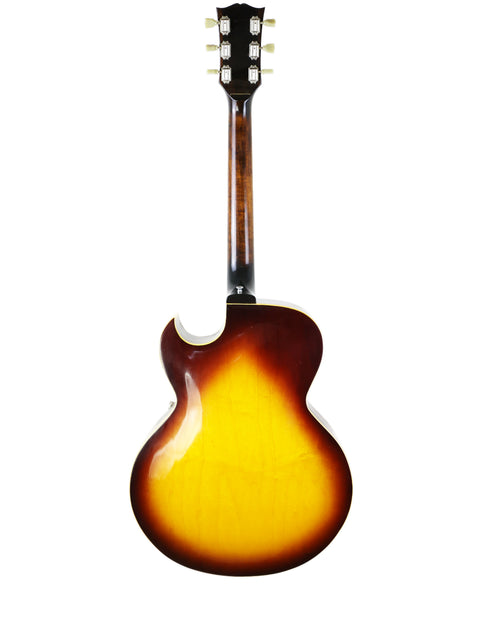 Classic 1970s Gibson ES-175D guitar featuring a beautiful sunburst finish, showcasing its vintage charm.