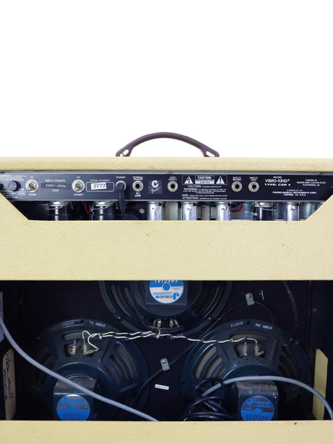 Close-up of a 2003 Fender Custom Shop Vibro-King Combo Amp, featuring the speaker and showcasing its unique design elements.