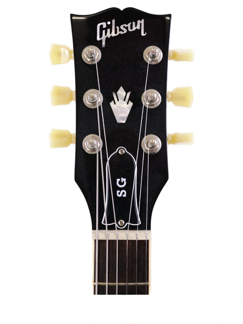 Close-up of a Gibson SG Standard '61 guitar, highlighting its sleek body, classic design, and rich color.