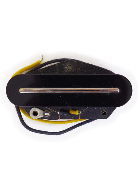 Close-up of a black guitar pick intertwined with yellow wires, showcasing the Lollar B.S. Telecaster Bridge Pickup, USA 2009.

