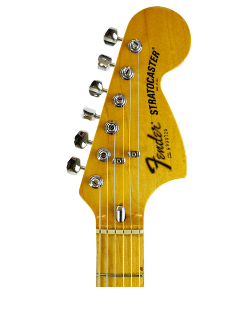 Close-up shot of a vintage Fender Stratocaster headstock from 1981, emphasizing its unique style and quality.
