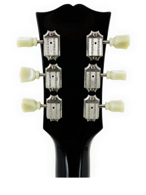 Close-up shot of the neck of a 1979 Tokai Les Paul Reborn LS50 electric guitar, emphasizing its unique features and quality.