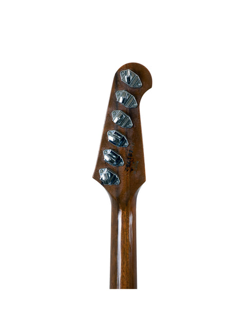 Detailed view of a Gibson Firebird V Reissue headstock, showcasing its metal head and wooden body, made in the USA, 1991.