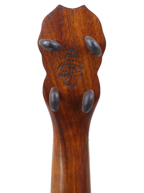Detailed view of a wooden guitar head from a 1927 Paul F. Summers 'Moana' Style 5 Koa Ukulele, showcasing craftsmanship.