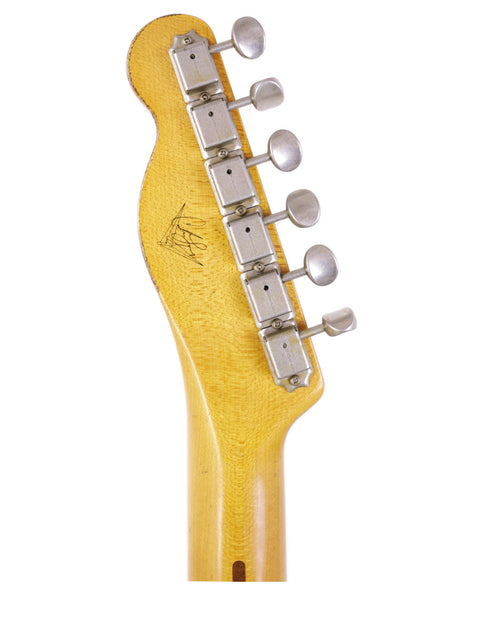  Detailed view of a yellow neck on a Fender Carlos Lopez Masterbuilt Nocaster, USA, 2019, emphasizing its artistic appeal.