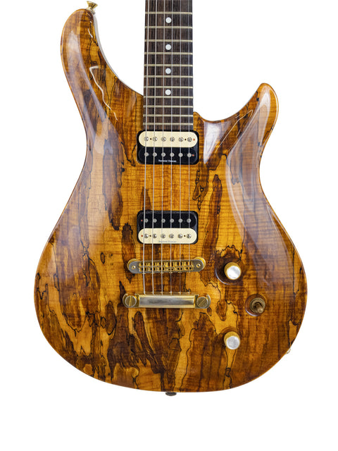 Ed Roman Quicksilver guitar featuring a wooden body and neck, exemplifying PRS style craftsmanship from 2004.