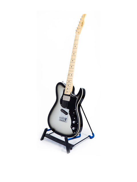 FGN Fujigen J Standard Iliad Tele-style guitar on a stand, featuring a minimalist white background.