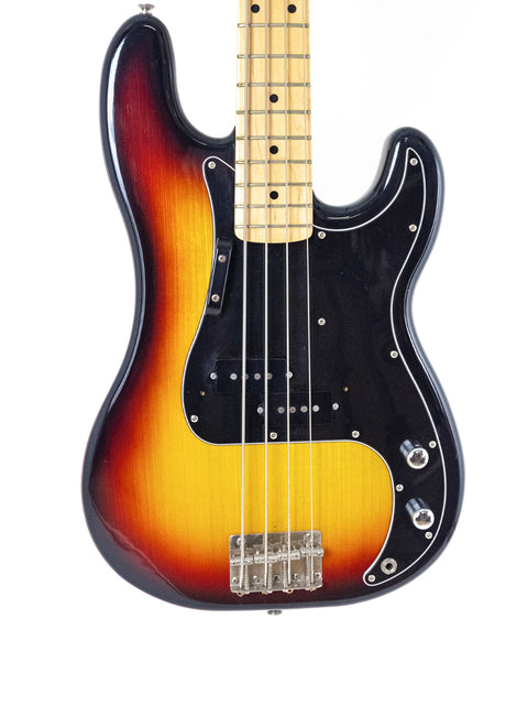 Fender American Standard Jazz Bass in sunburst finish, alongside a Fernandes P Bass from Japan, 1978-81, showcasing vintage style.