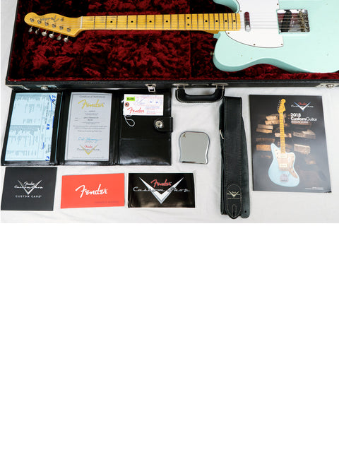 Fender Custom Shop 60s Journeyman Telecaster with case and accessories, showcasing a classic electric guitar design.