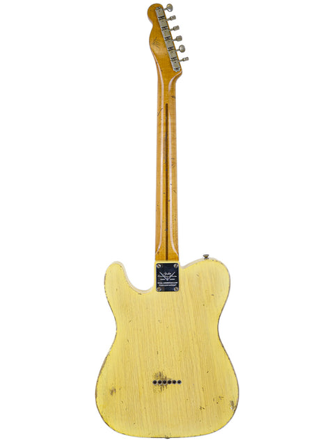 Fender Master Built Carlos Lopez 70th Anniversary Broadcaster guitar featuring a beautifully crafted wooden body and neck.