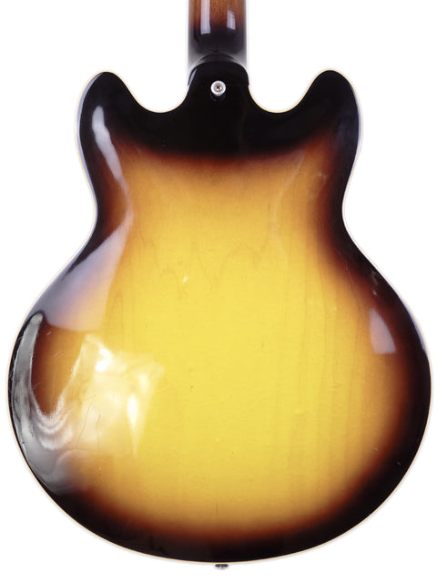 Gibson Custom Shop ES 339 guitar with a striking sunburst finish, crafted in Memphis, USA, in 2009, highlighting its beauty.