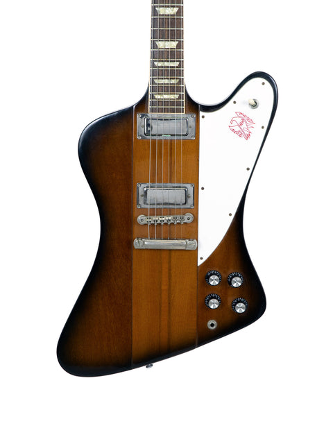 Gibson Firebird V Reissue guitar from 1991, featuring a brown body and a white pickguard, showcasing classic design.