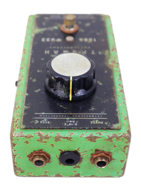 Green and black Trueman 1966 fuzz pedal with a white knob, a classic piece of music equipment from Russia, 2021.