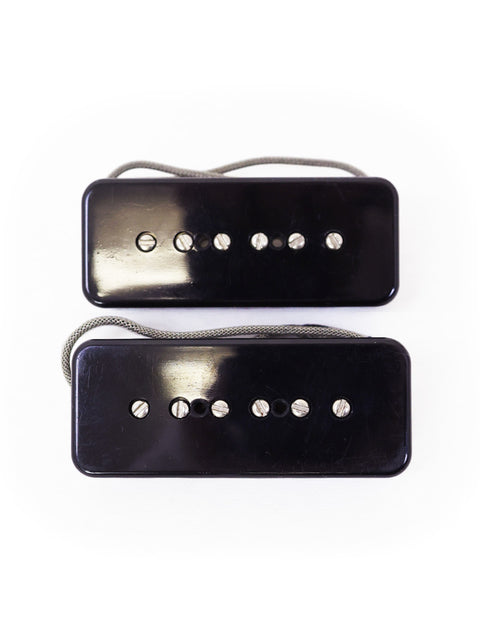 Image of two black pickups featuring silver dots, identified as Peter Florance Voodoo P90 Pickups, USA 2000.