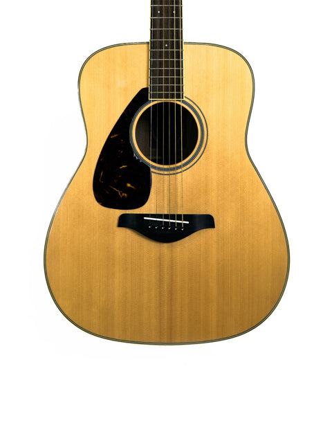 Left-handed Yamaha FG 720 SL acoustic guitar from Japan, model FX-1, crafted in 2012, showcasing its beautiful design.