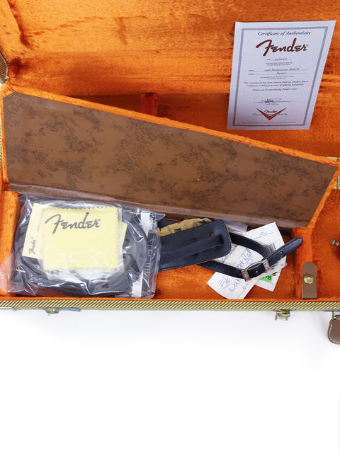 Orange case containing a Fender Custom Shop ’56 Stratocaster Relic, representing classic design and quality from the USA, 2008.