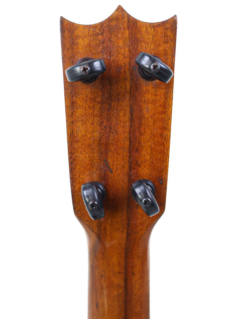 Rear view of the headstock and tuners on the Aloha/Akai Style 2 Concert Ukulele, showcasing the classic design and functional elements from the 1930s.