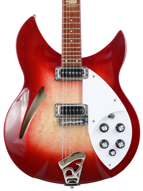 Rickenbacker 330 guitar in Fireglo, featuring a red finish with a white body and neck, made in the USA, 2006.
