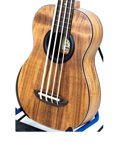 Side view of aNueNue Im Bass Koa Bass Ukulele displaying the body curvature and natural finish.