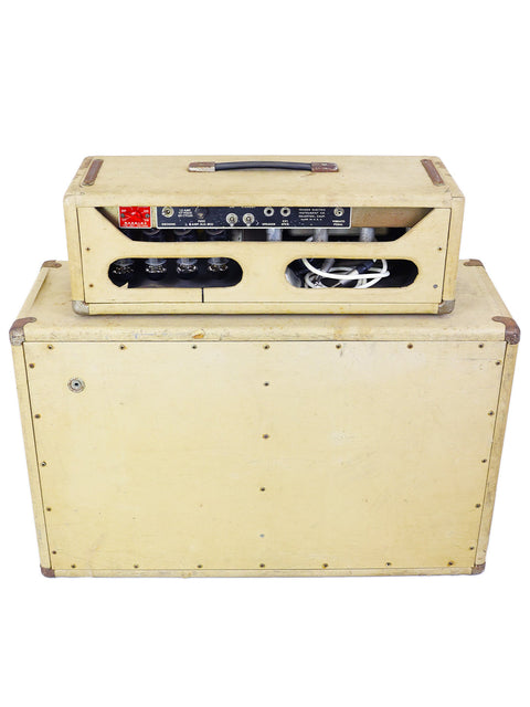 Side view of a 1963 Fender Bandmaster amp and cabinet, highlighting their timeless vintage appeal.