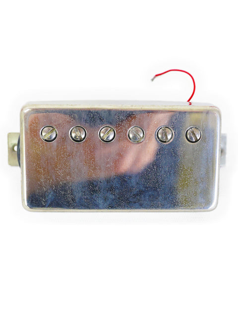 Silver pickup with four holes and a red dot, labeled as Peter Florance Voodoo Humbucker ’59 Pair, made in the USA, 2005.