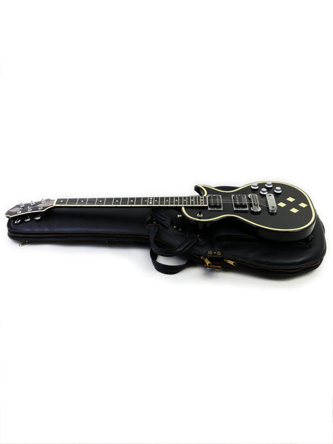Stunning black electric guitar featuring a classic white pickguard, ideal for serious players. Greco Zemaitis GZ-2600IF from Japan, 2004.