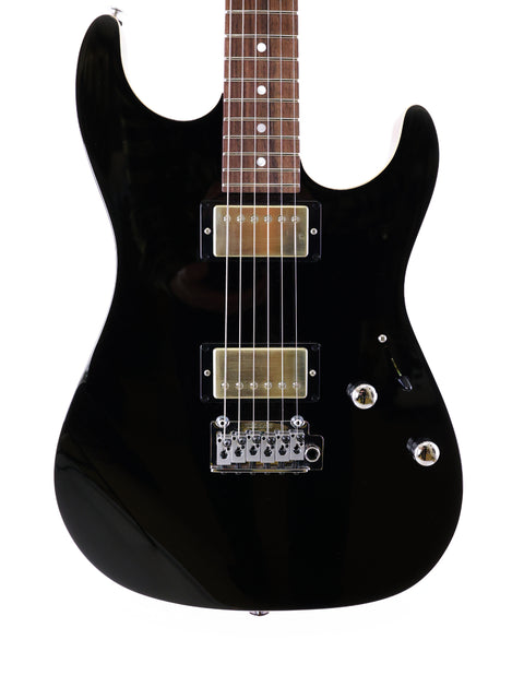 Suhr Pete Thorn Signature electric guitar in black with a white pickguard, made in the USA, 2021 model.
