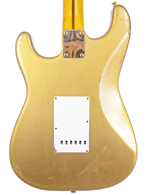 The 1988 Homer Haynes Limited Edition Stratocaster features a stunning gold top, highlighting its unique and collectible appeal.