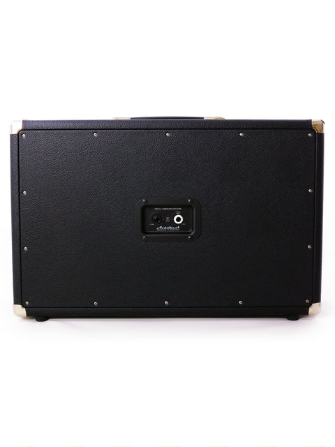 The Achillies 2x10 Extension Cabinet, a stylish black amplifier case adorned with luxurious gold hardware, from Australia, 2022.
