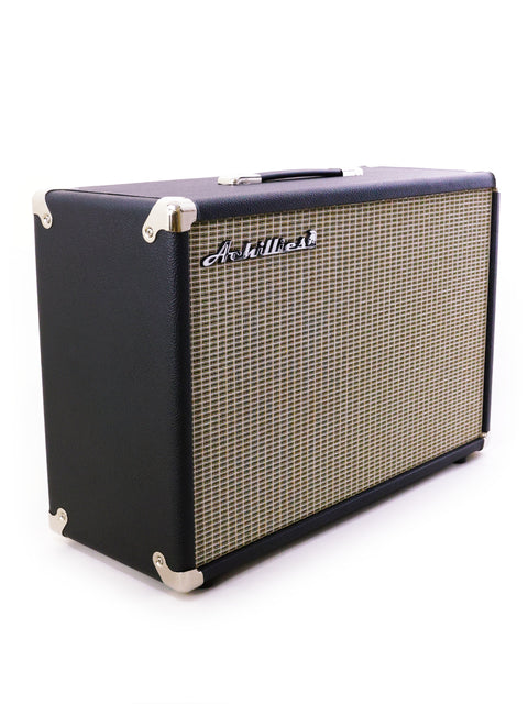The Achillies 2x10 Extension Cabinet features a stylish black and gold amplifier set against a clean white background, 2022.